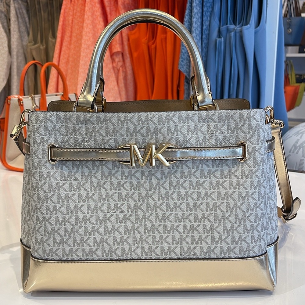 MICHAEL KORS 
Reed Large Central Zip Graphic Logo Belted Satchel
Pale Gold 
NWT